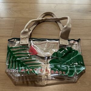 Benefit Transparent Tote with Green Leaf Design